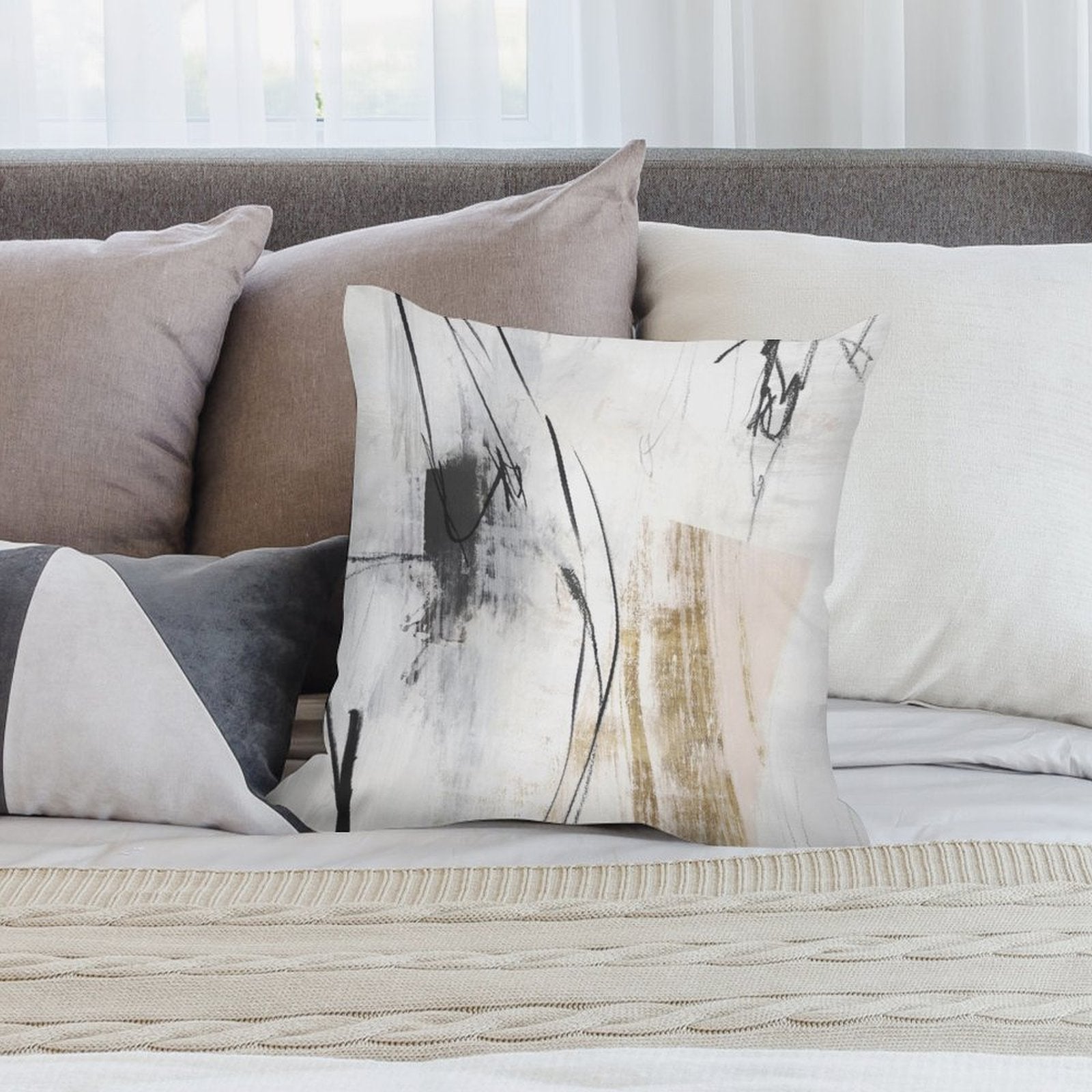 Abstract art plush pillow cover in cream, black, and gold. Soft, fluffy decorative pillow for sofa, couch, or living room.