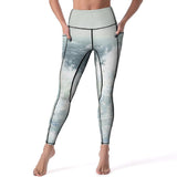 High-waisted yoga pants with pockets, artistic wave design, perfect for yoga or workout.