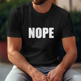 Black Gildan unisex "NOPE" t-shirt, cotton, comfortable for casual wear.
