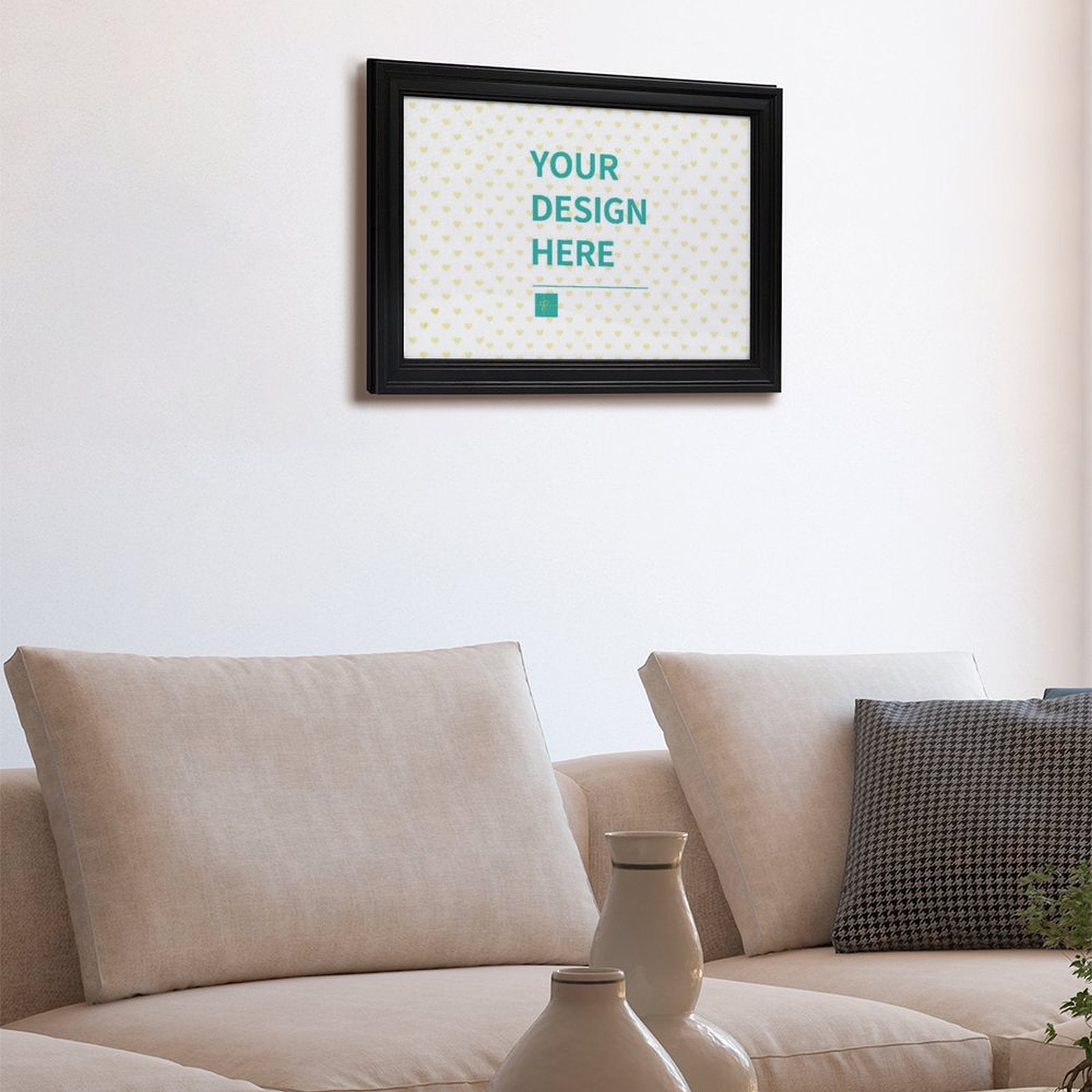 Custom canvas print with 'YOUR DESIGN HERE' text in black frame, personalized wall art for home decor.