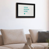 Custom canvas print with 'YOUR DESIGN HERE' text in black frame, personalized wall art for home decor.