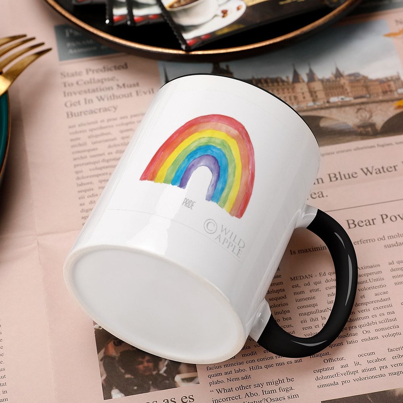 Personalized white ceramic Pride mug with rainbow design and black handle from MyArtsyGift. Made in USA.