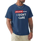 Navy blue men's crew neck t-shirt with 'Breaking News I Don't Care' graphic, MyArtsyGift. Comfortable cotton tee.