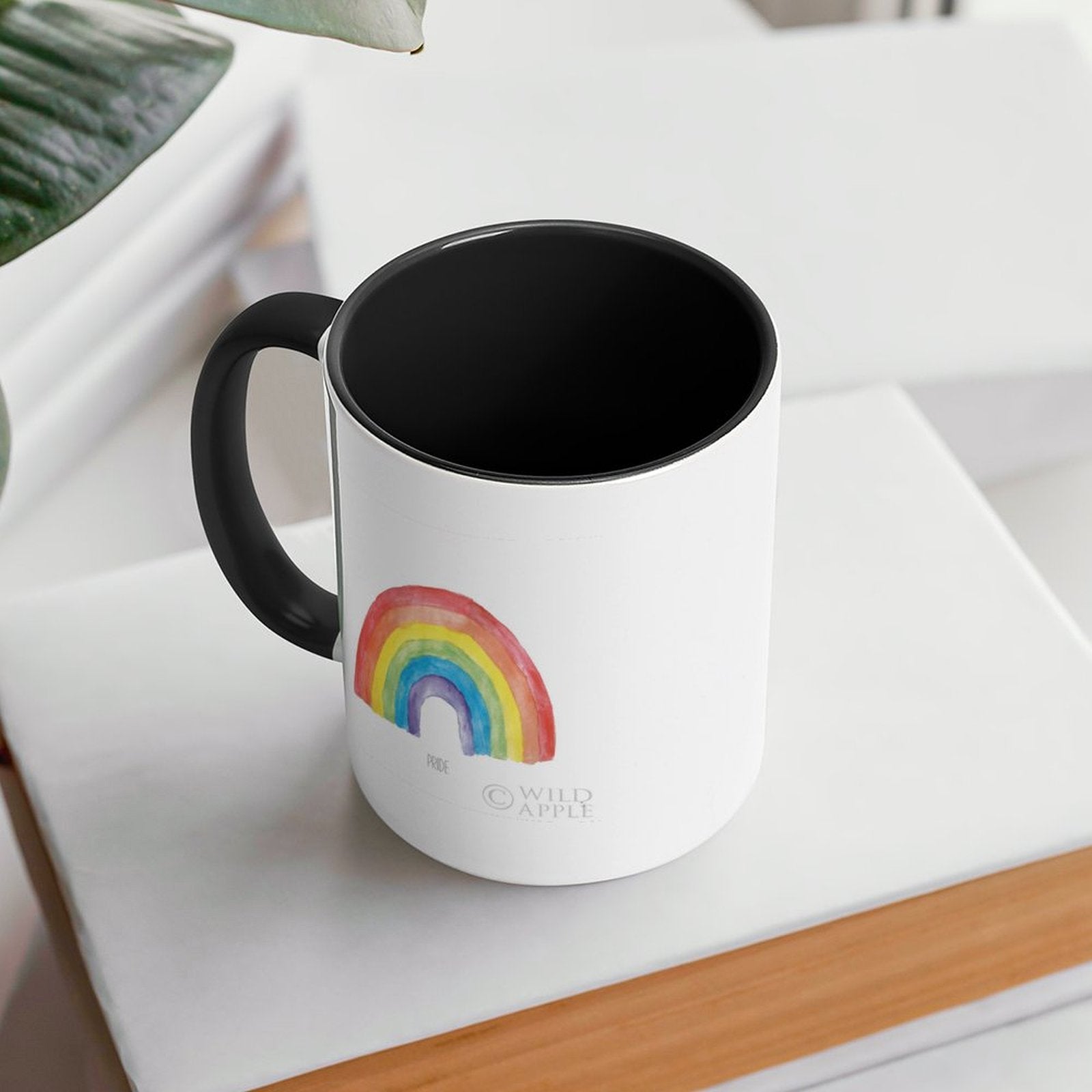 White ceramic Pride mug with rainbow design, black handle, and inner color, MyArtsyGift gift.