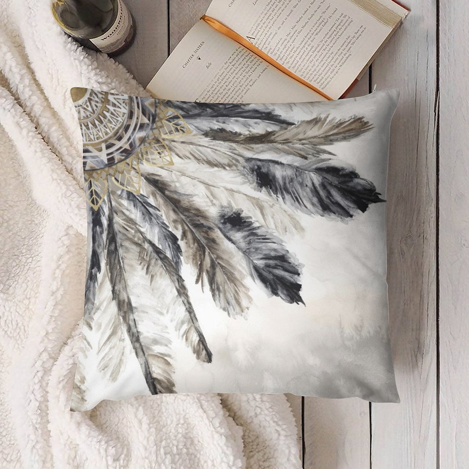 Plush throw pillow cover with watercolor feather design in shades of gray and gold, perfect for home decor.