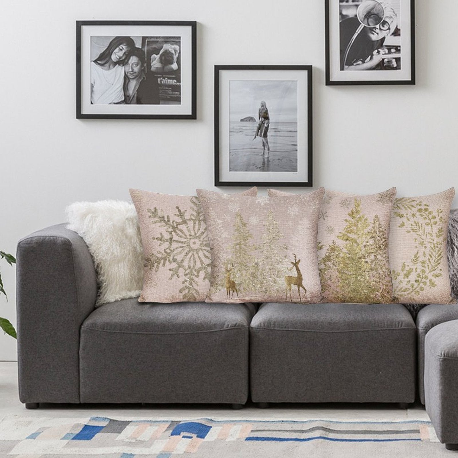 Cotton Linen Pillow Case Set of 4 with Christmas designs, gold snowflake, trees, and deer on sofa.