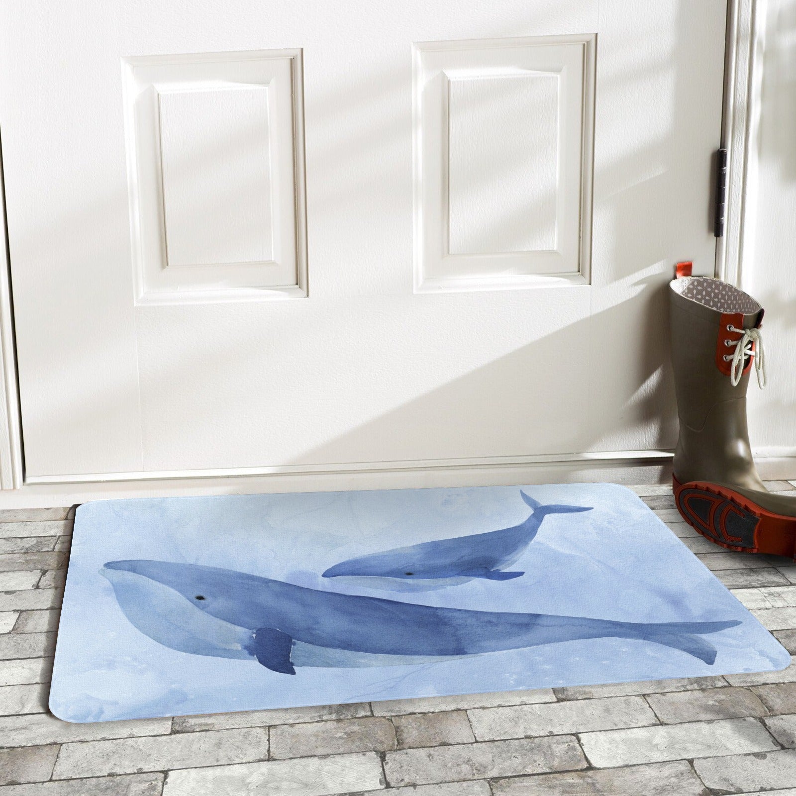 Blue Whale II doormat with watercolor whales design, indoor/outdoor rubber floor mat