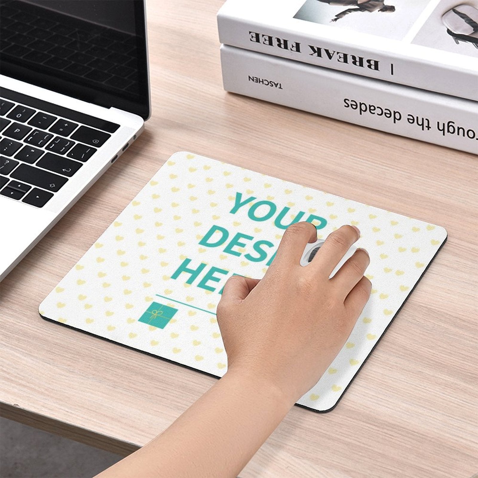 Personalized mousepad with "YOUR DESIGN HERE" text, heart pattern, white mouse on wood table, perfect for office and gaming.