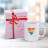 Personalized white ceramic mug with rainbow heart, Love is Love text, and gift box. Perfect for Pride celebrations.