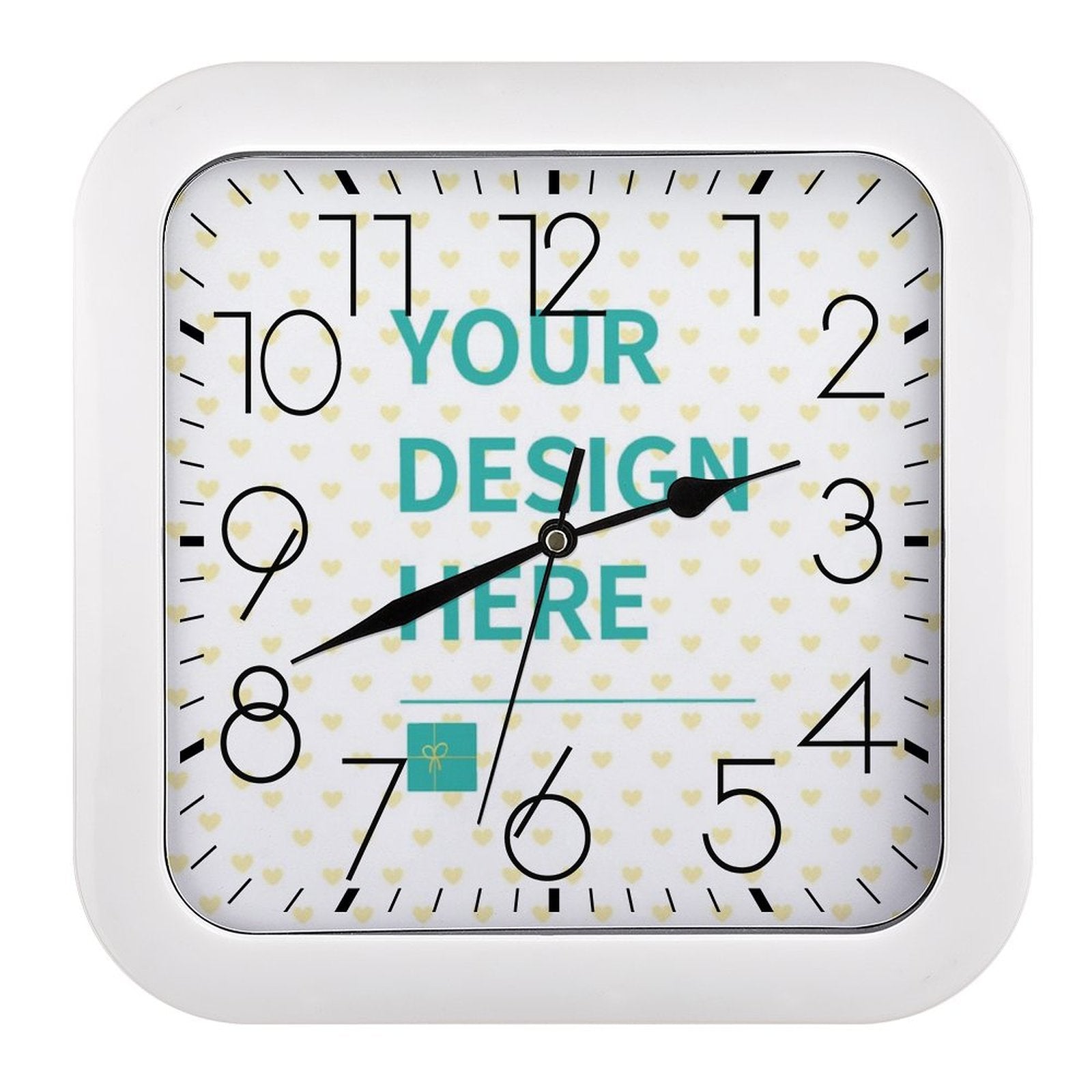 Customizable square wall clock with 'Your Design Here' for home decor. White frame, silent ticking, and heart pattern.