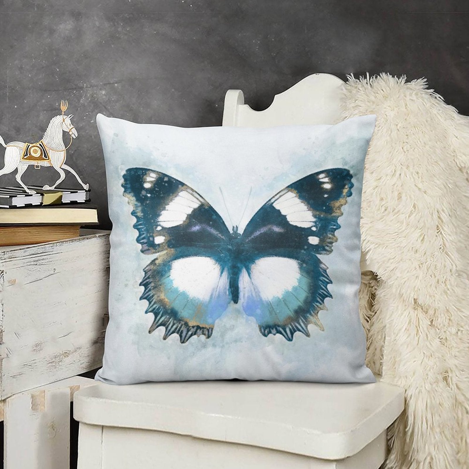 Blue butterfly decorative pillow cover, soft short plush material, for sofa, couch, or bedroom.