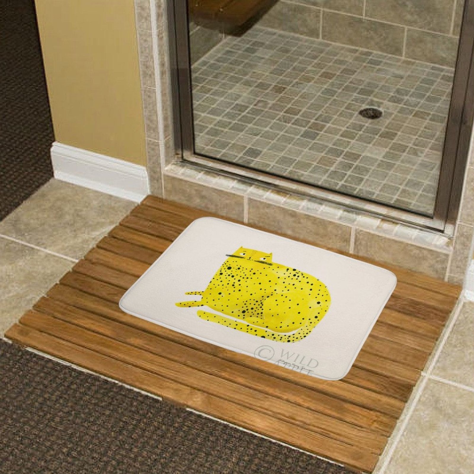 Yellow cheetah design bath rug in bathroom on wooden floor, non-slip and absorbent