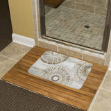 Coral velvet bath rug with gold mandala design on wooden mat, non-slip for bathroom