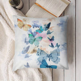 Butterfly pillow cover for sofa decor. Soft plush with watercolor butterflies in shades of blue, turquoise and orange.