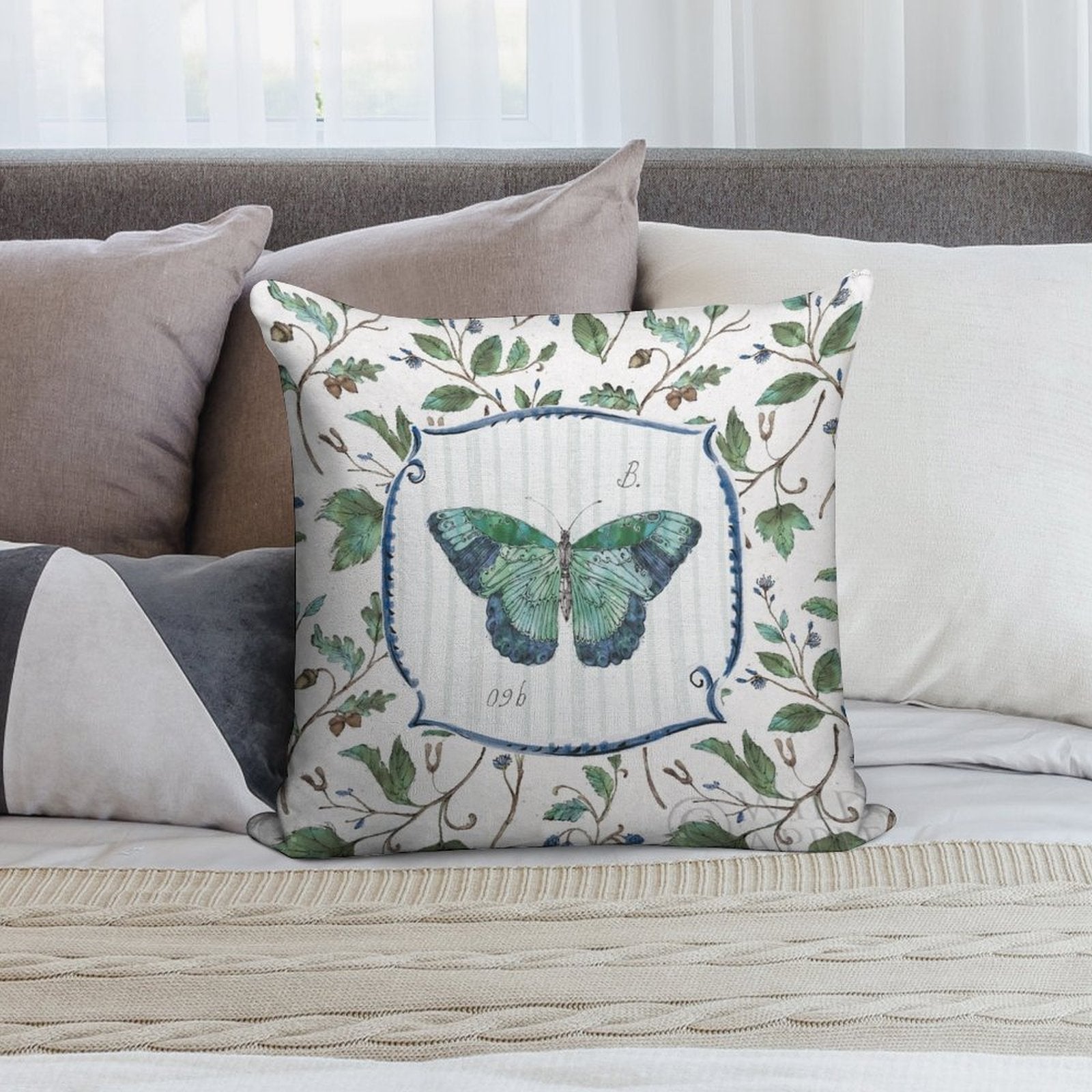 Butterfly throw pillow for living room decor. Features watercolor butterfly design, leaves and vines.