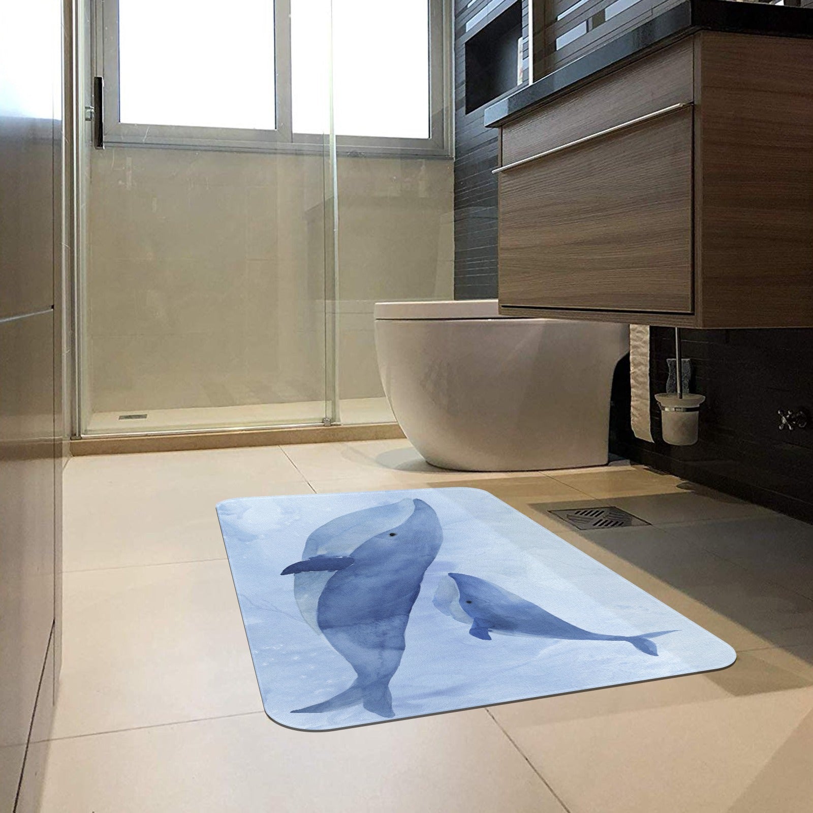 Blue Whale II doormat in a bathroom. Rubber floor mat with whale watercolor design for home decor.