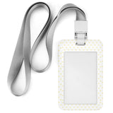 White ID badge holder with yellow hearts and a grey lanyard. Ideal for office ID cards.