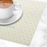 Flax placemat with heart pattern under coffee cup, dining table decor