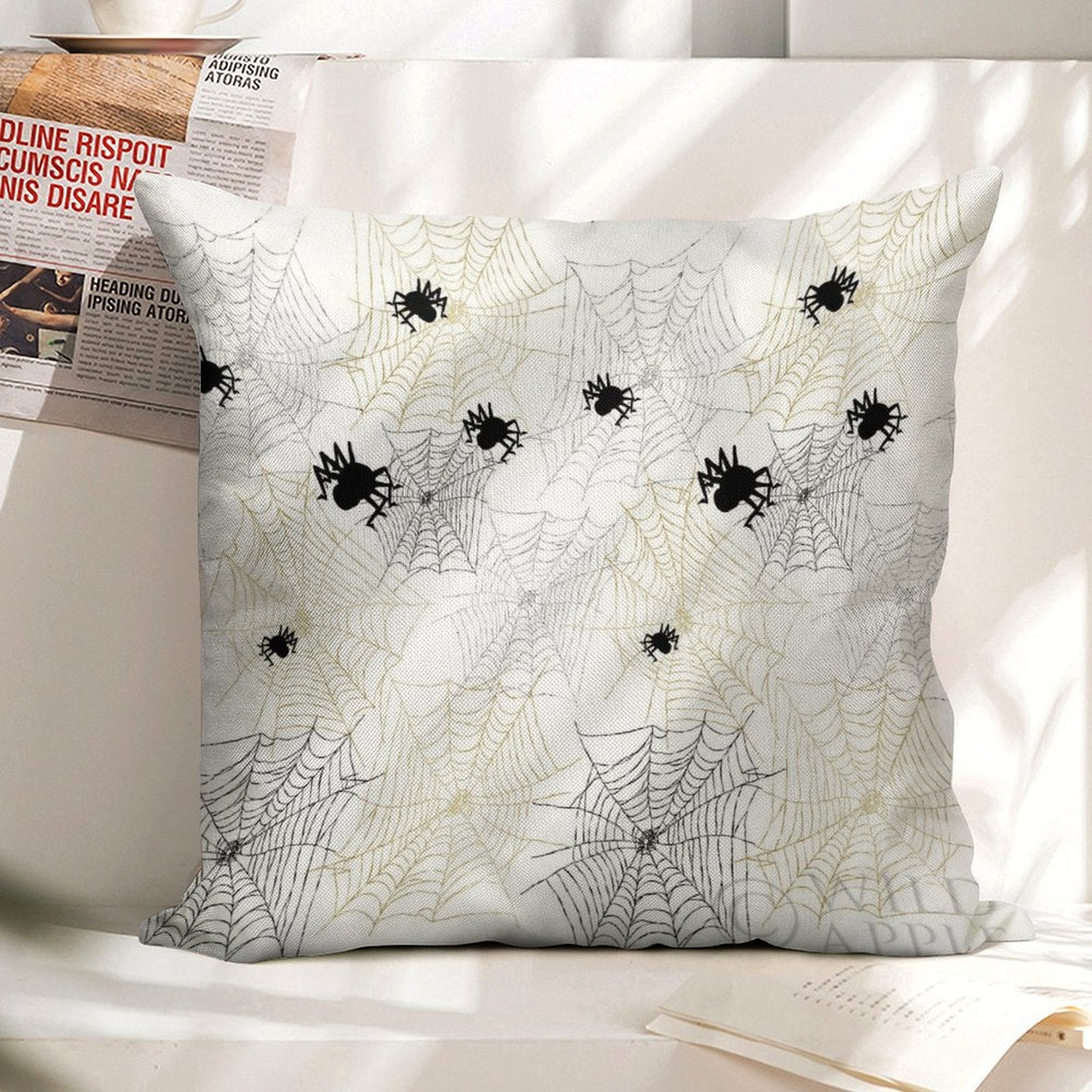 Linen throw pillow case with black spider and spiderweb design, perfect Halloween decor