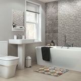 Modern bathroom with geometric patterned bath rug. Non-slip, quick-drying floor carpet for bathroom, kitchen, and bedroom.