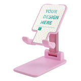 Customizable pink phone stand with YOUR DESIGN HERE design, adjustable height, for phones and tablets.