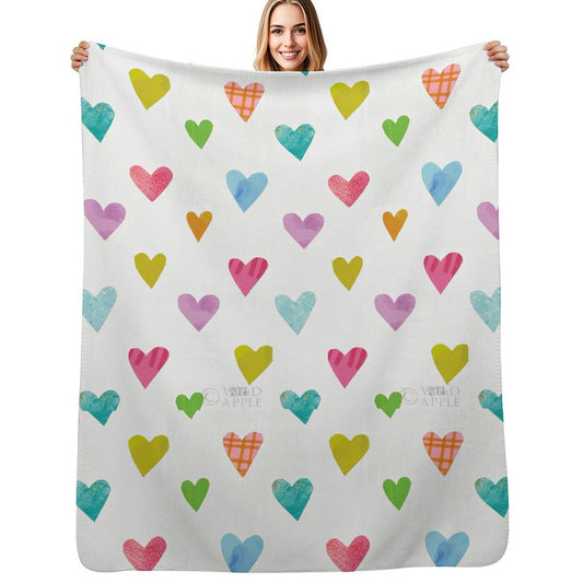 Unicorn Magic fleece blanket with colorful hearts, soft, cozy, and made in USA, perfect gift.