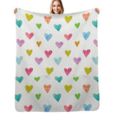 Unicorn Magic fleece blanket with colorful hearts, soft, cozy, and made in USA, perfect gift.