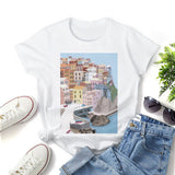 White short sleeve crewneck t-shirt with colorful town graphic print, casual wear.