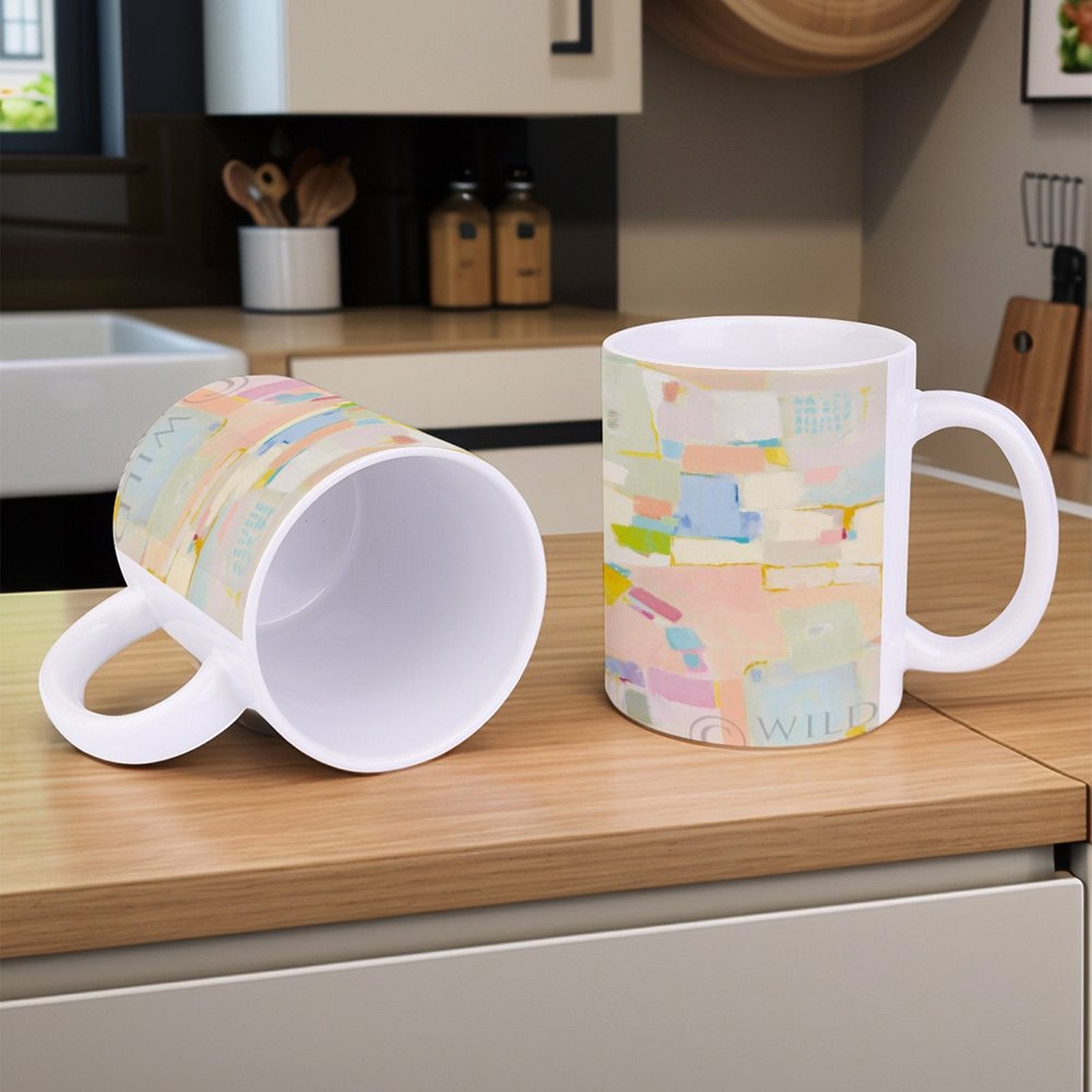 White ceramic mug with colorful abstract art, featuring 'WILD' text, perfect personalized gift