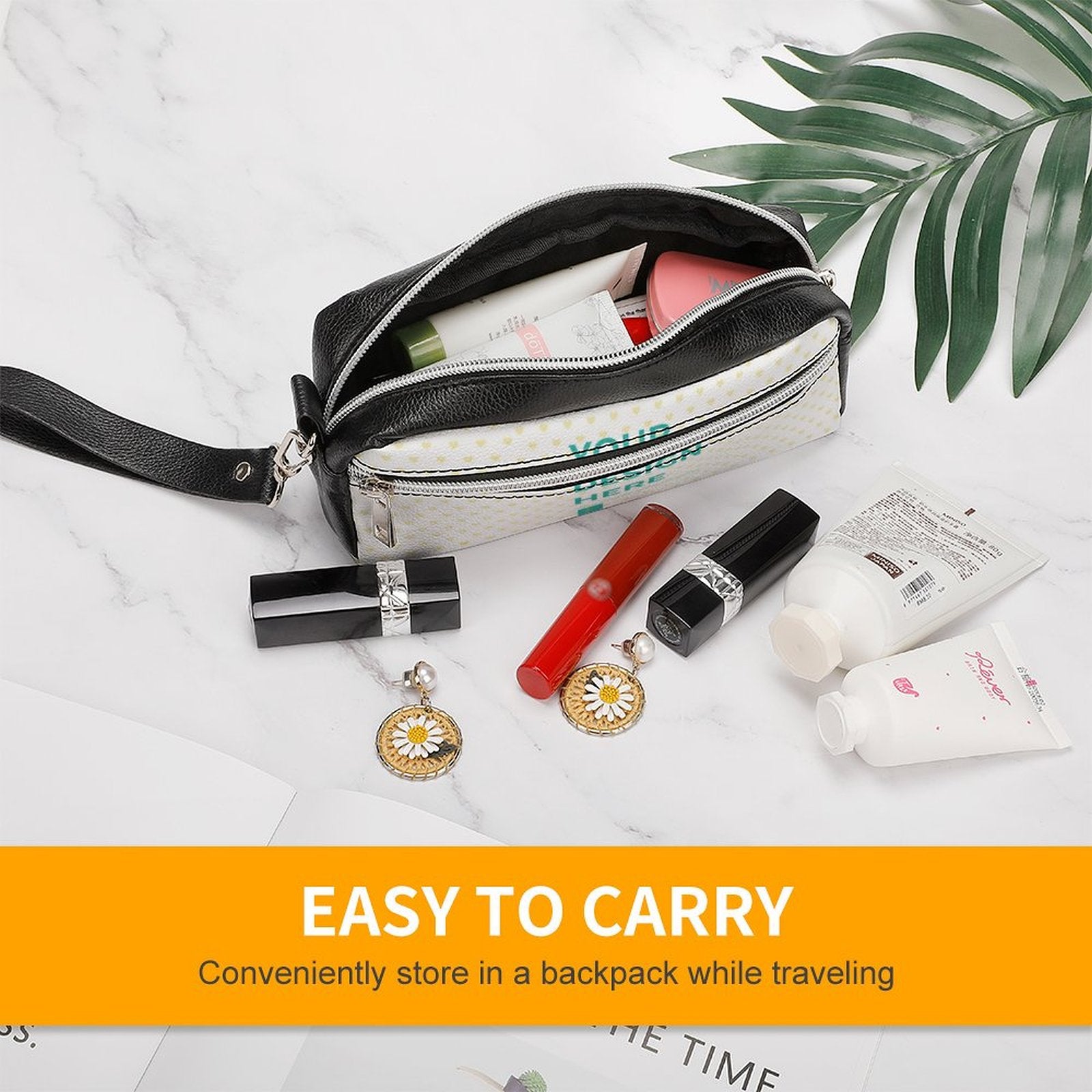 Black leather pen bag with 'YOUR DESIGN HERE' print, suitable for cosmetics, double zipper and handle.