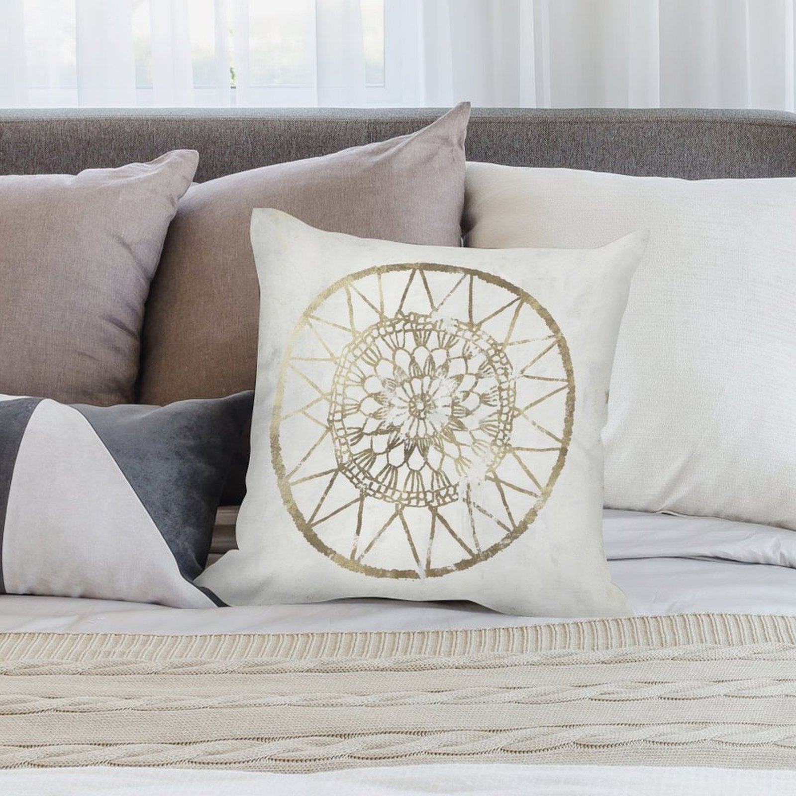 White plush throw pillow with gold mandala design, perfect for sofa or couch decor