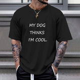 Black Gildan Unisex T-shirt with "My Dog Thinks I'm Cool" print, cotton fabric, comfortable fit.