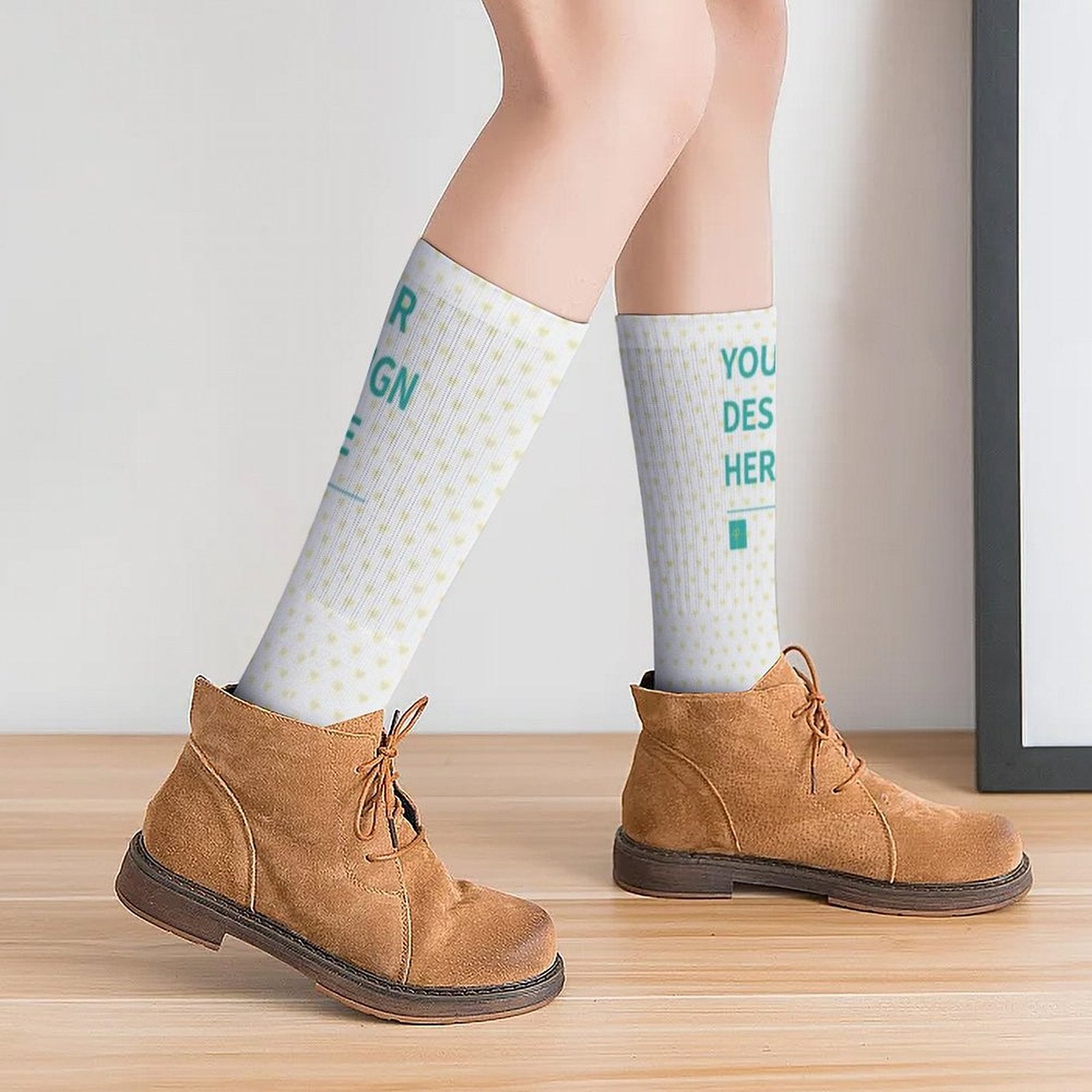 Customizable white knee-high socks with dotted pattern and 'YOUR DESIGN HERE' print, a perfect personalized Christmas gift.