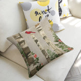 Christmas linen pillow cover with birch tree, cardinal design, and 'sweet love' accent pillow on sofa