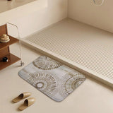 Coral velvet bath rug with gold sunburst design, non-slip bathroom floor carpet