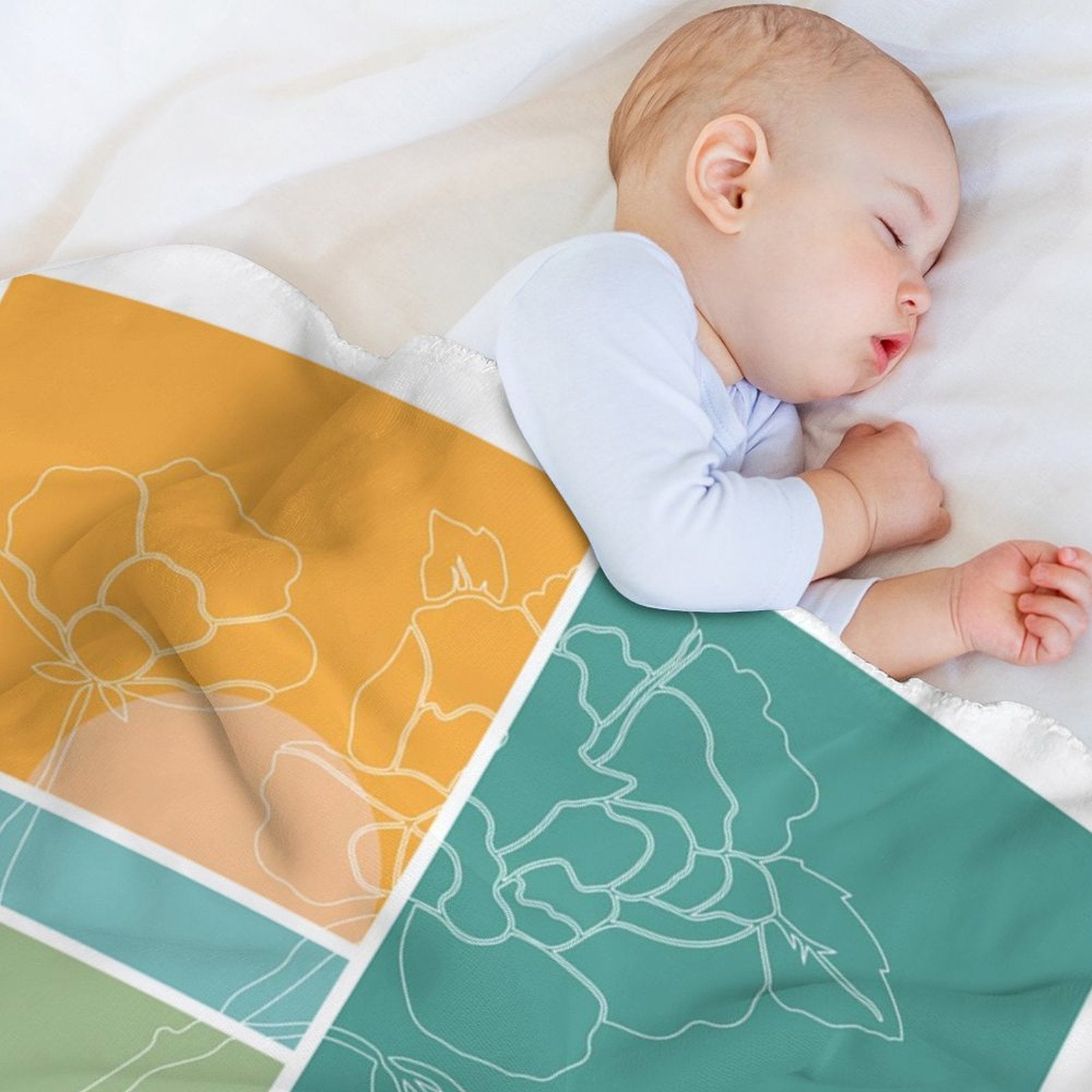 Baby sleeping on a MyArtsyGift floral design lamb wool fleece blanket, perfect for bed and travel