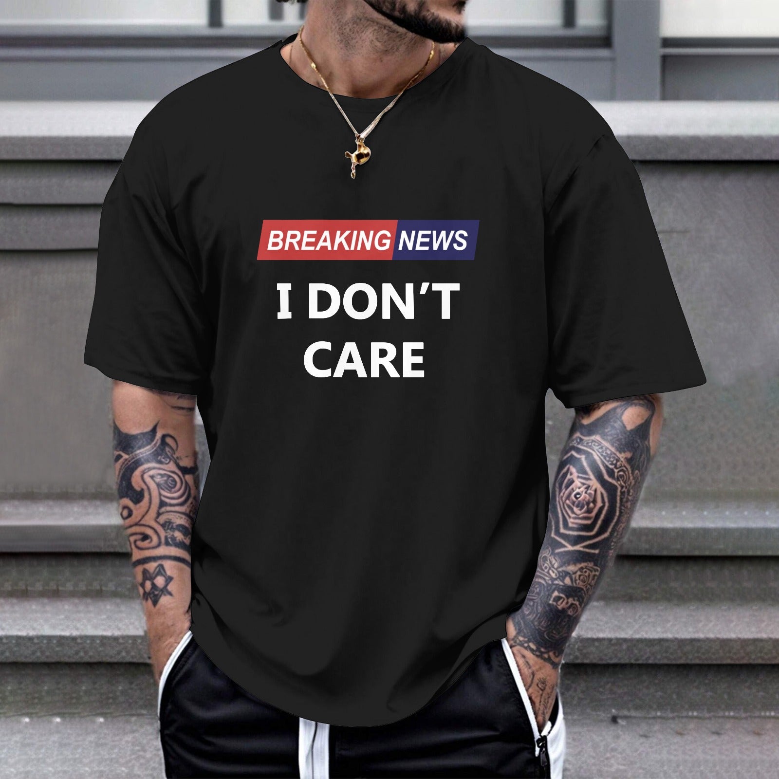 Black Gildan Unisex T-shirt with "Breaking News I Don't Care" print. Comfortable cotton tee for expressing individuality.