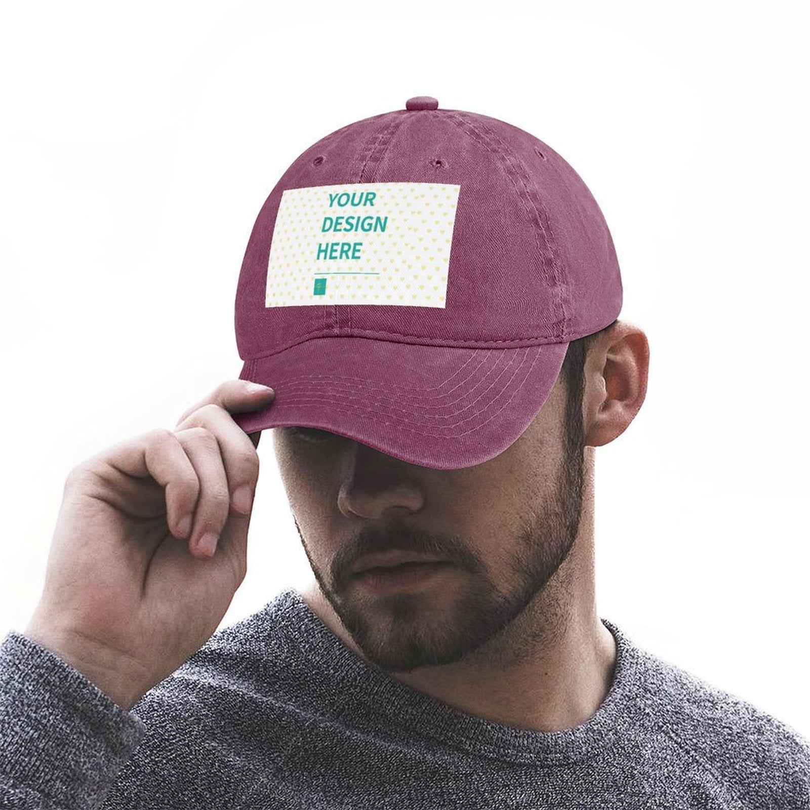 Custom burgundy baseball cap with 'YOUR DESIGN HERE' design on a man, customizable hat for men and women