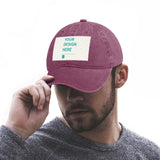 Custom burgundy baseball cap with 'YOUR DESIGN HERE' design on a man, customizable hat for men and women