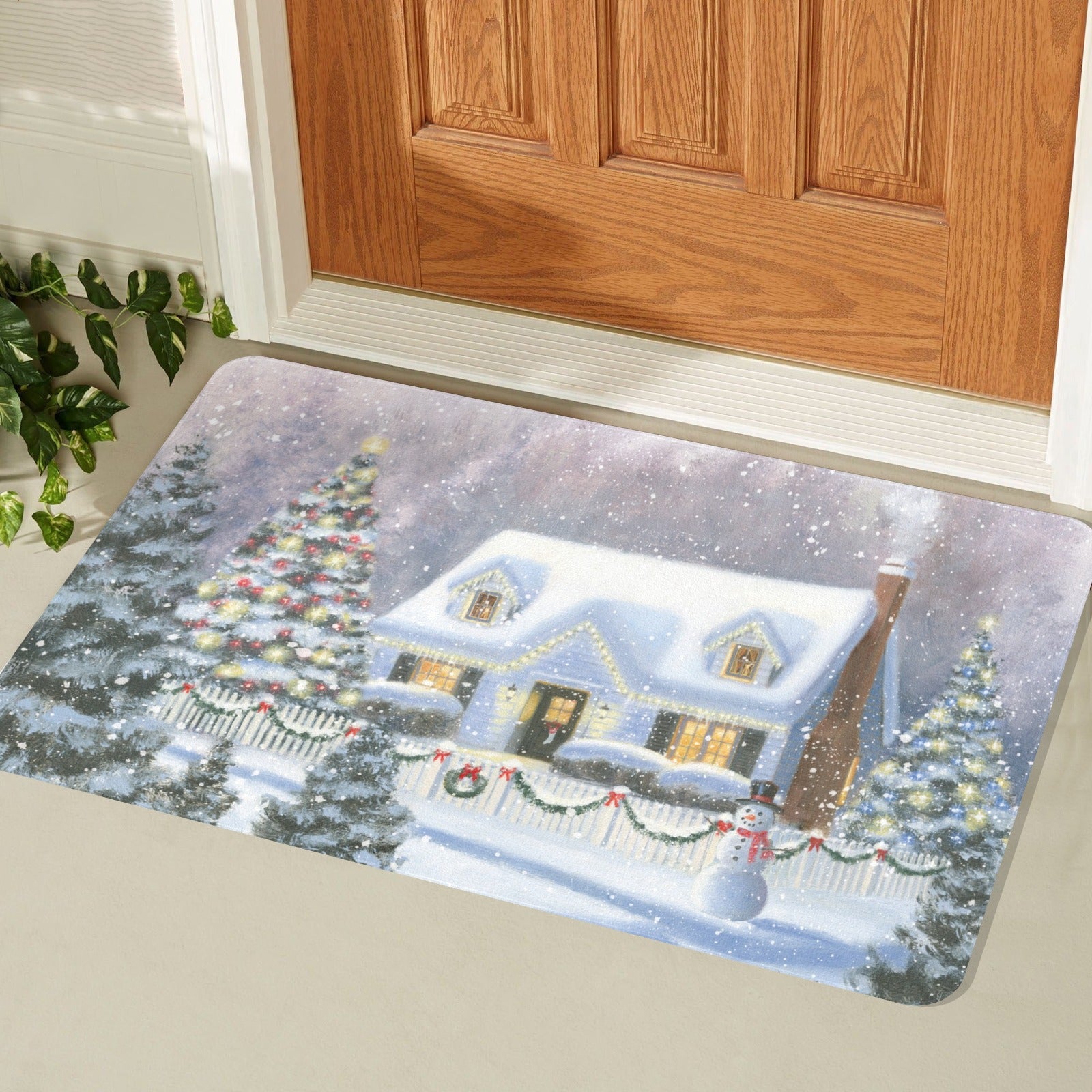 Christmas door mat with winter house and tree, for indoor or outdoor use.