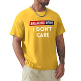 Yellow men's crew neck t-shirt with "BREAKING NEWS I DON'T CARE" print, classic tee for men.