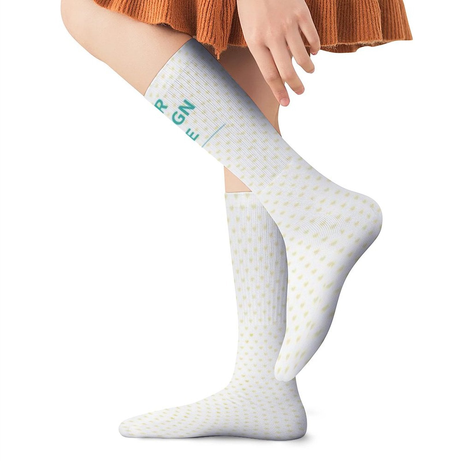 Custom knee-high socks in white, featuring dotted pattern and 'REGEN' print, perfect Christmas gift.