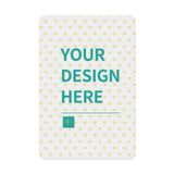 Custom metal tin sign with 'YOUR DESIGN HERE' text and heart pattern, ready for personalization.