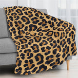 Leopard print flannel blanket, soft and cozy, perfect for home decor.