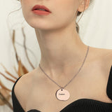 Rose gold double disc personalized charm necklace with custom engraving, titanium steel, ideal for gifting.