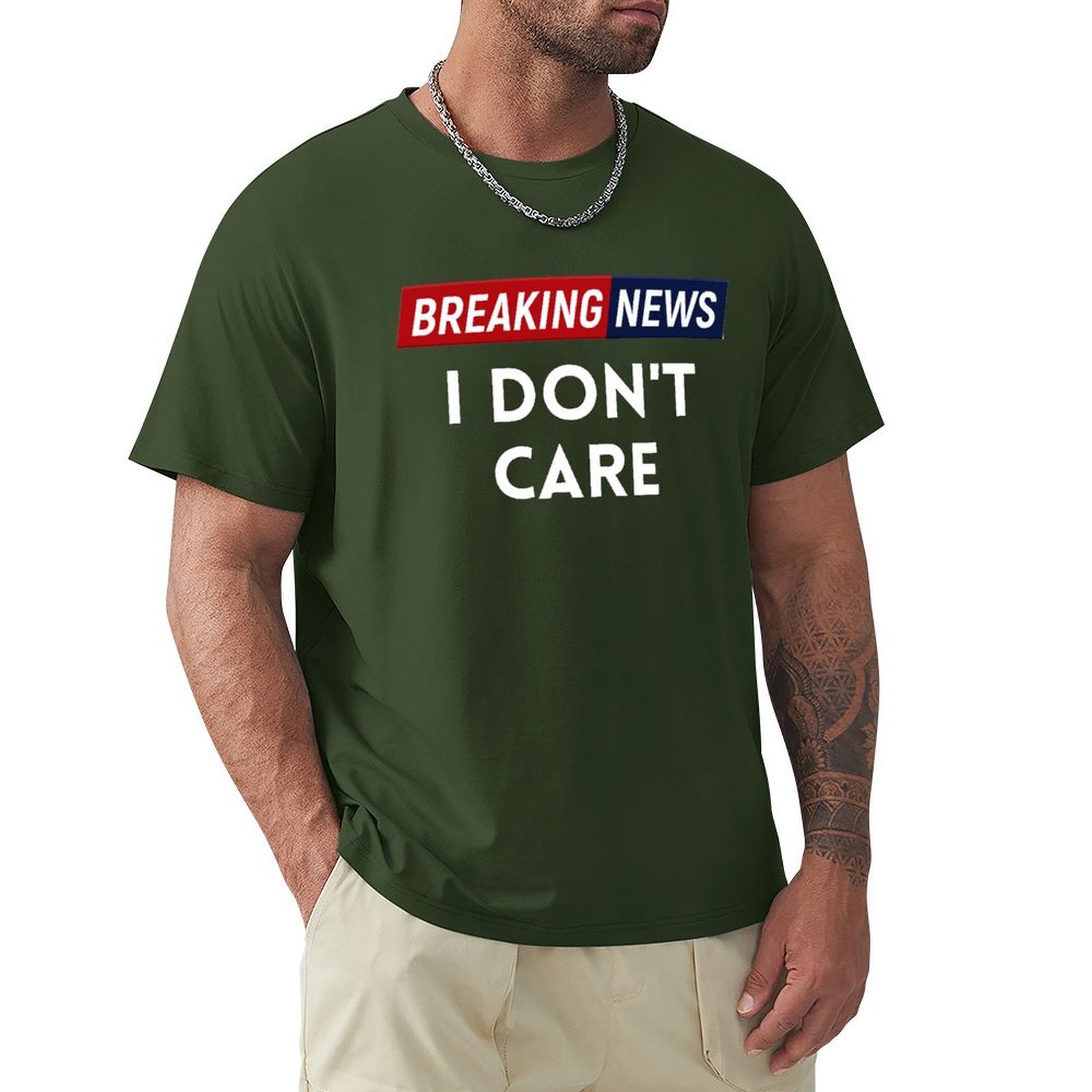 Green men's crew neck t-shirt with "BREAKING NEWS I DON'T CARE" print; classic men's tee, S-6XL.