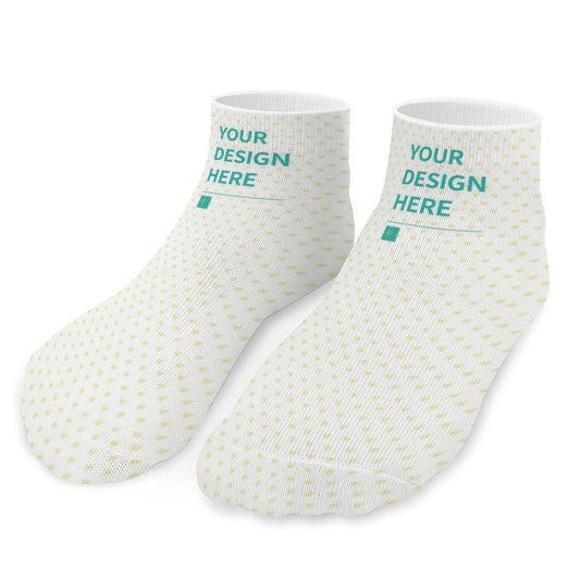 Customizable socks featuring 'YOUR DESIGN HERE' text, soft polyester material.
