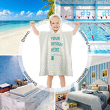 Customizable baby hooded towel with 'YOUR DESIGN HERE', perfect for bath, beach, or pool. Soft, absorbent towel for kids.
