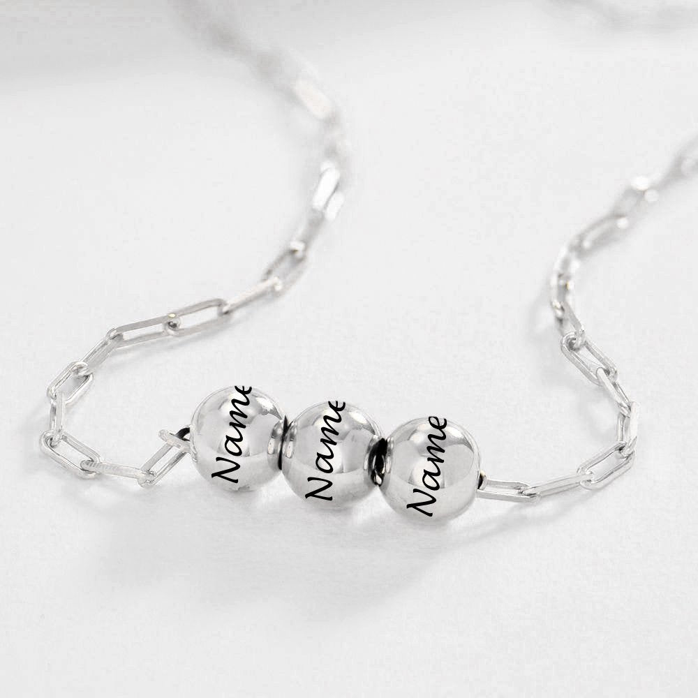 Silver custom name necklace with three engraved bead pendants, personalized jewelry gift for men and women.
