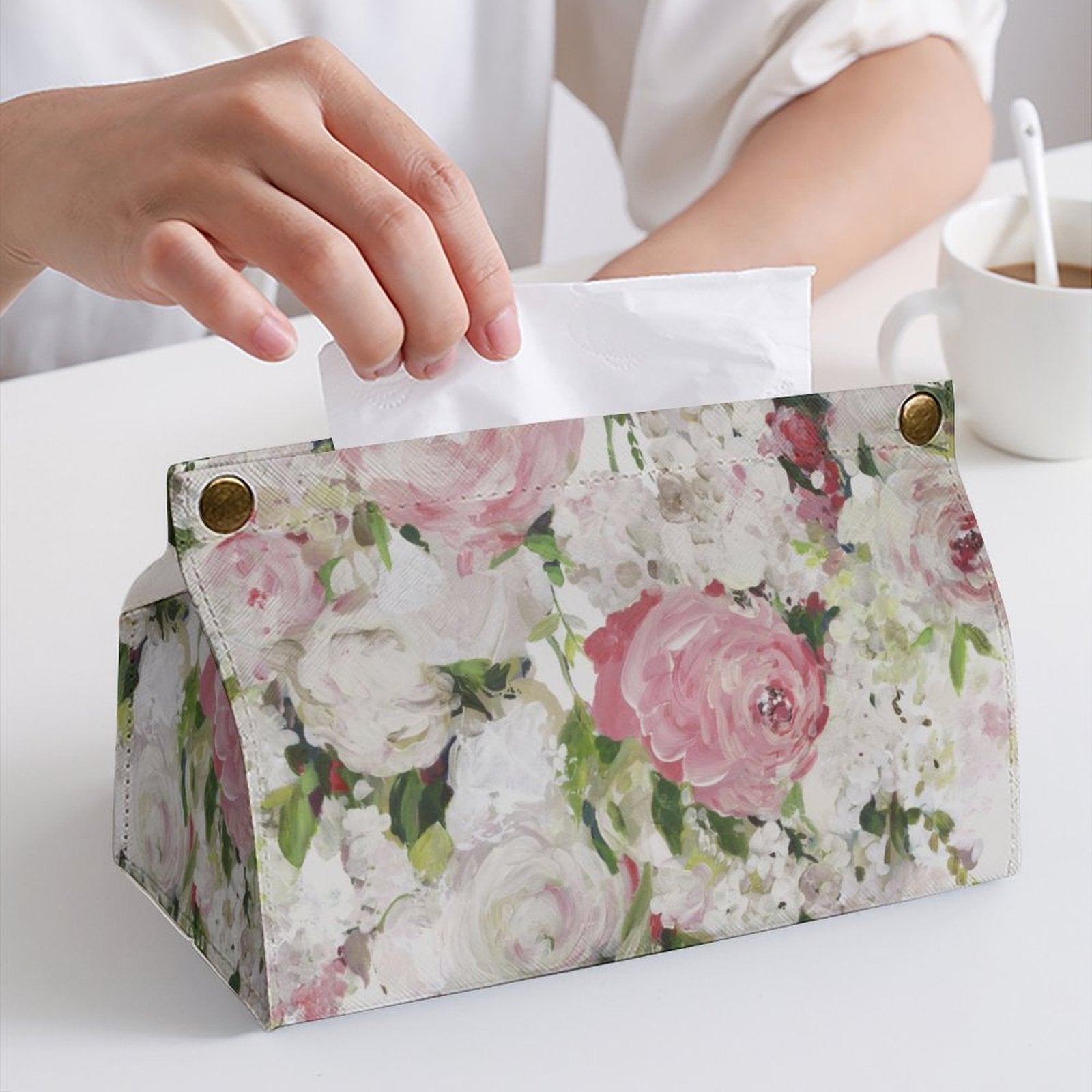 Rectangular floral PU tissue box cover with hand reaching for tissue. Ideal for bathroom, office, or home use.